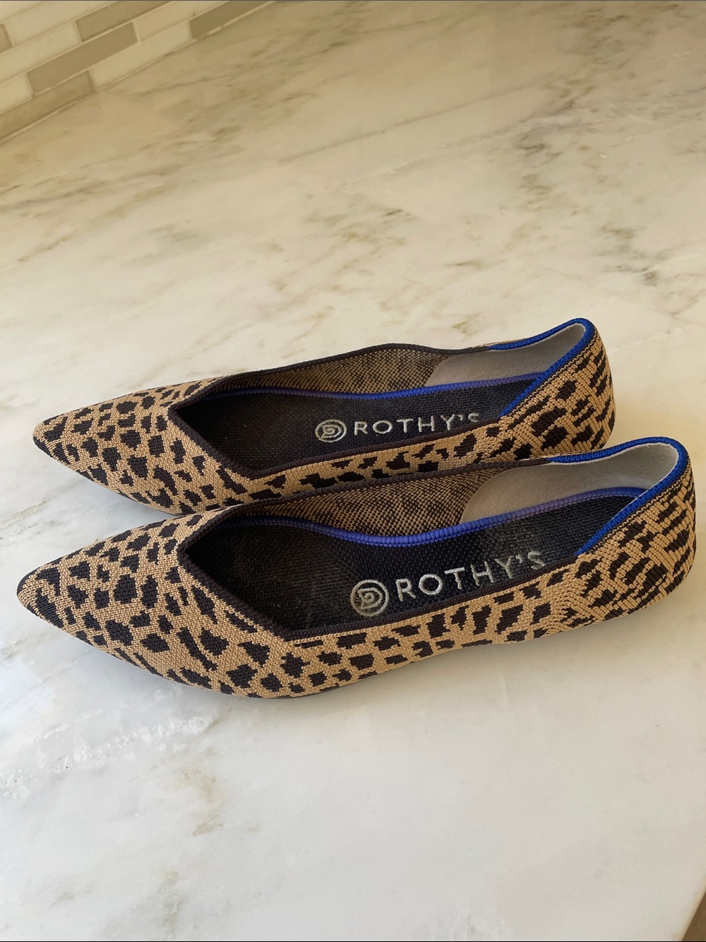 Rothy's Leopard Print Pointed Flats in Tan and Black with Blue Trim
